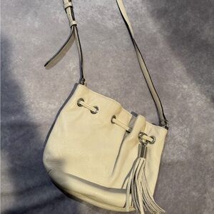 Michael Kors White Pebbled Leather Drawstring Bucket Crossbody Tassel Bag